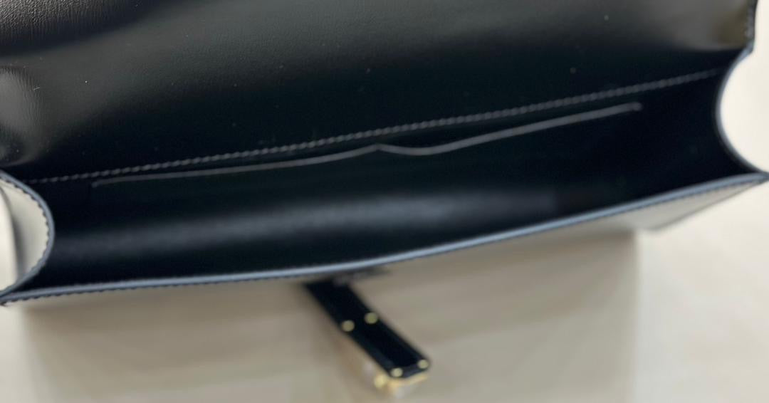 SS 2026 Shiny Leather Clutch - draft